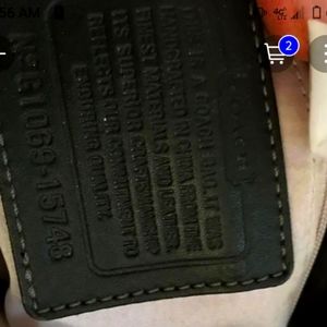 I paid 300 dollars for this coach purse I don't really want to sell it butineed$